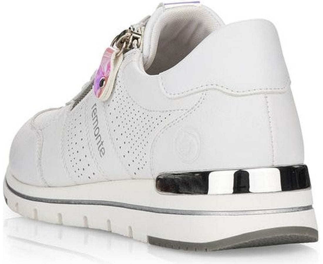 white casual closed sport shoe